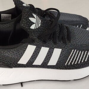 NWOT Women's Black Adidas with white stripes